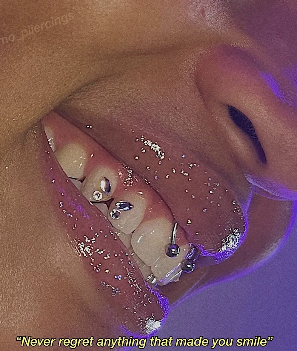 Smiley piercing and tooth gems